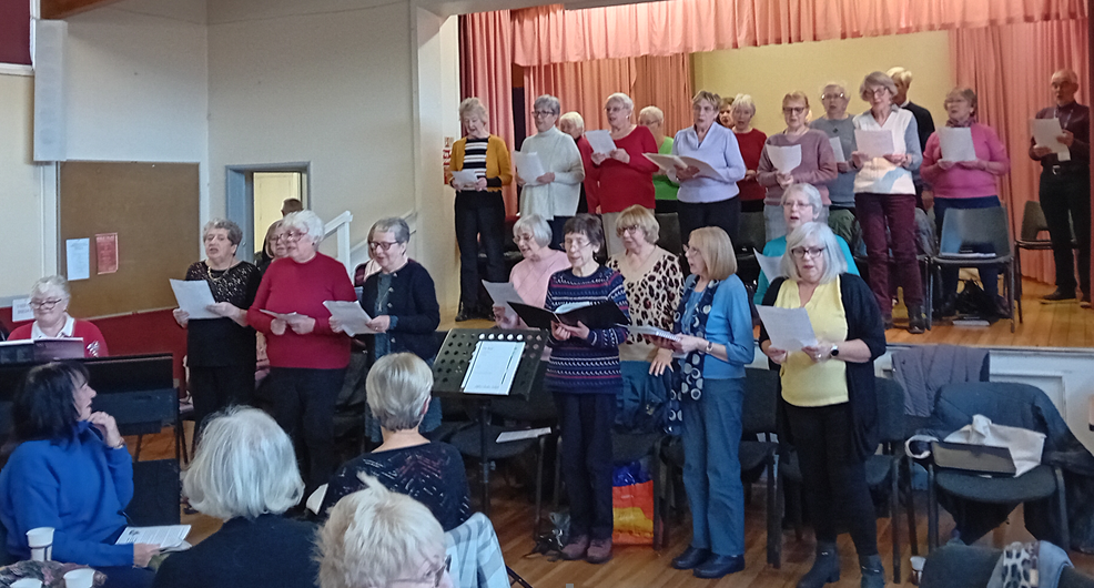 Picture of group singing at a Coffee Morning