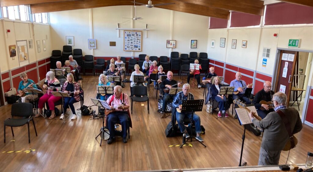 Picture of a group meeting – members learning something new