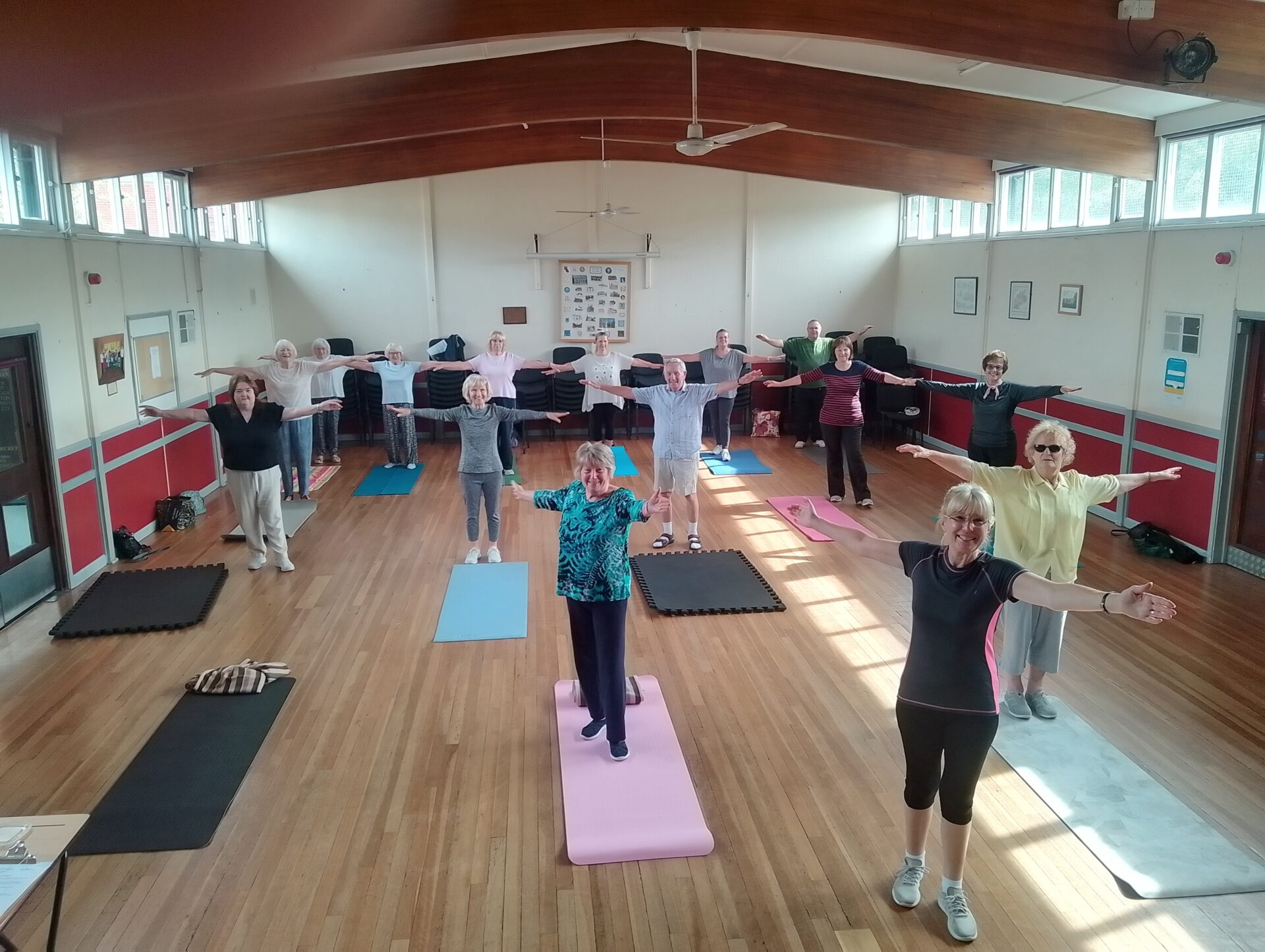 Stretch class demonstrating one of their moves