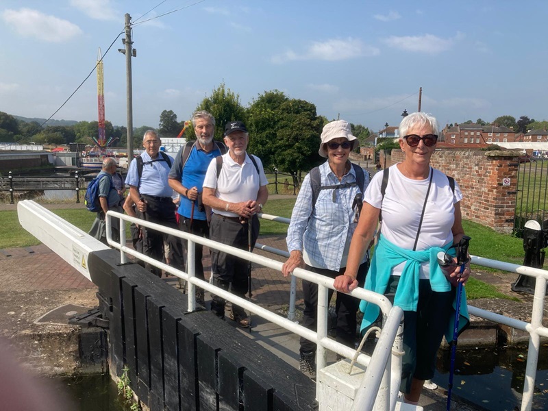 Challenge walkers crossing lock gates at Stourport
