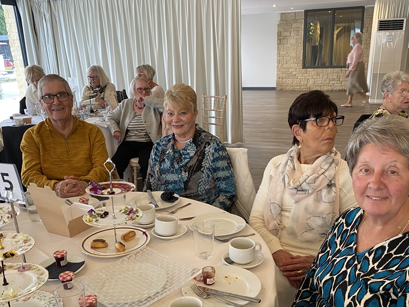 MOTO members enjoying a cream tea on a trip to the Cotswolds