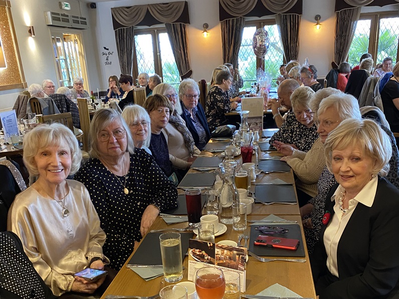 Members at a long table ready for lunch at the Punchbowl during Elvis tribute