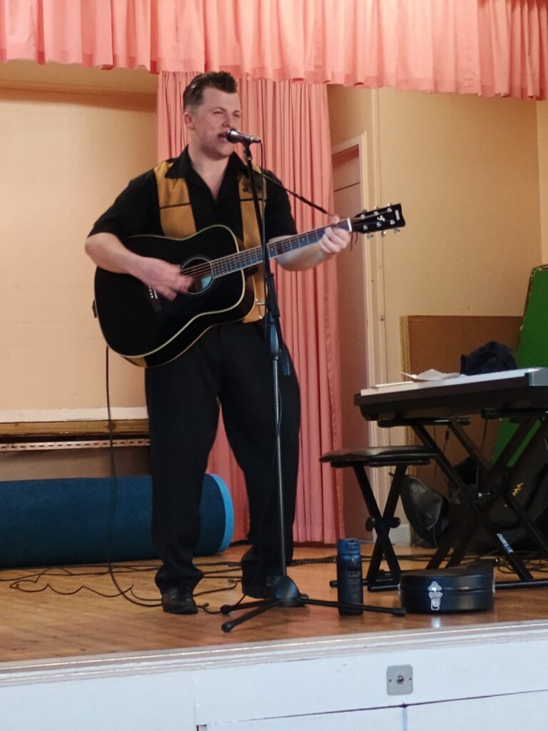Joe James Thomas on the guitar