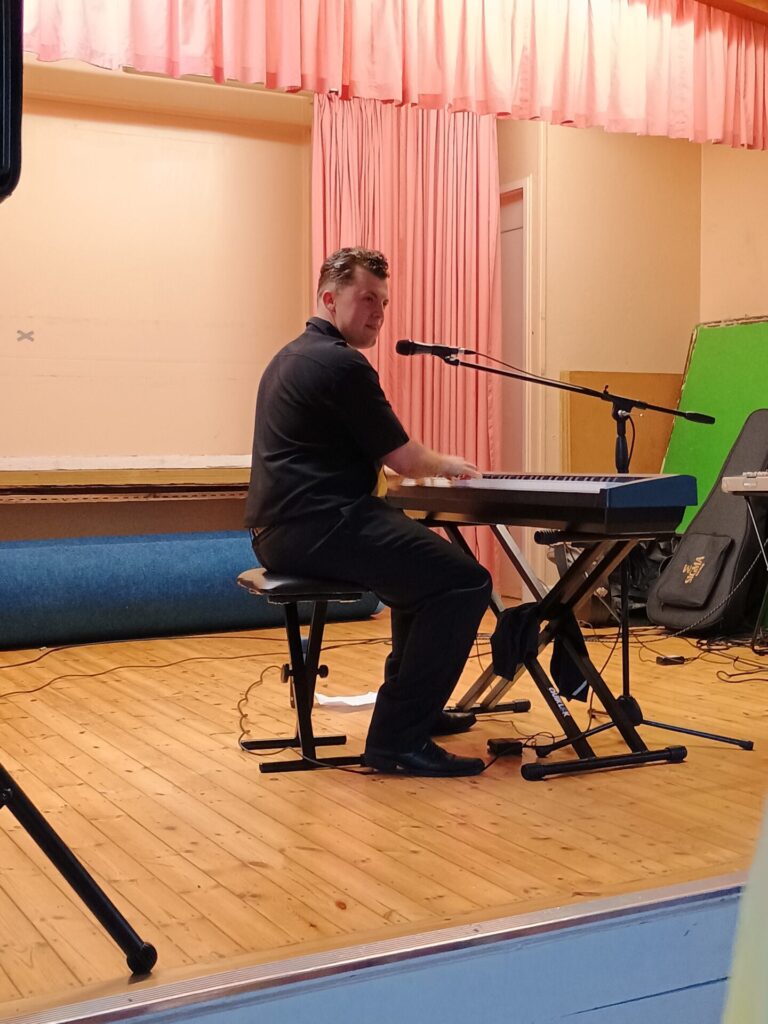 Joe James Thomas on the keyboard