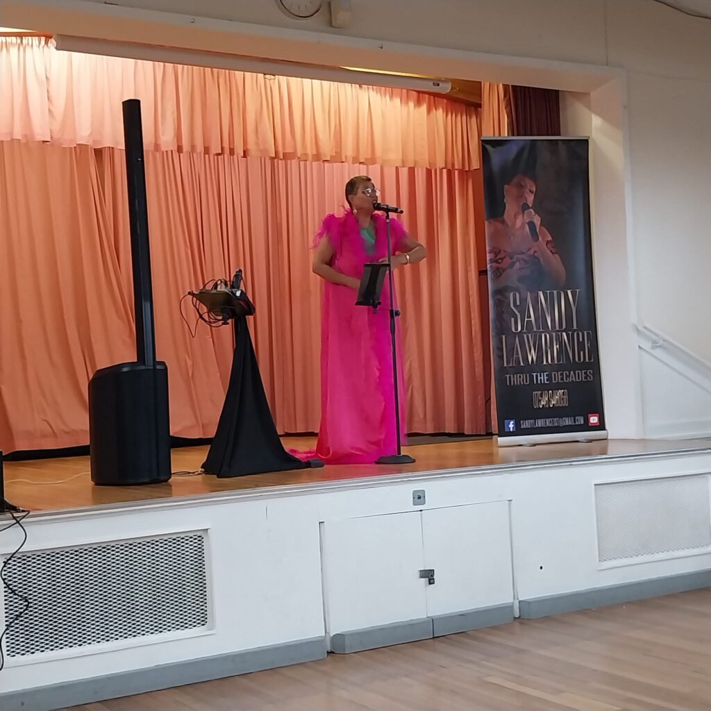 Sandy Lawrence sings